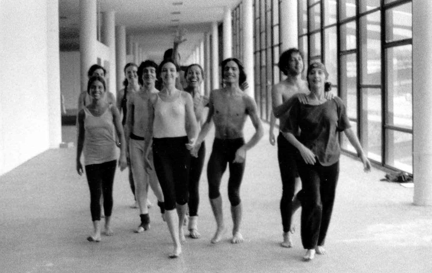 10 dancers walking towards the camera